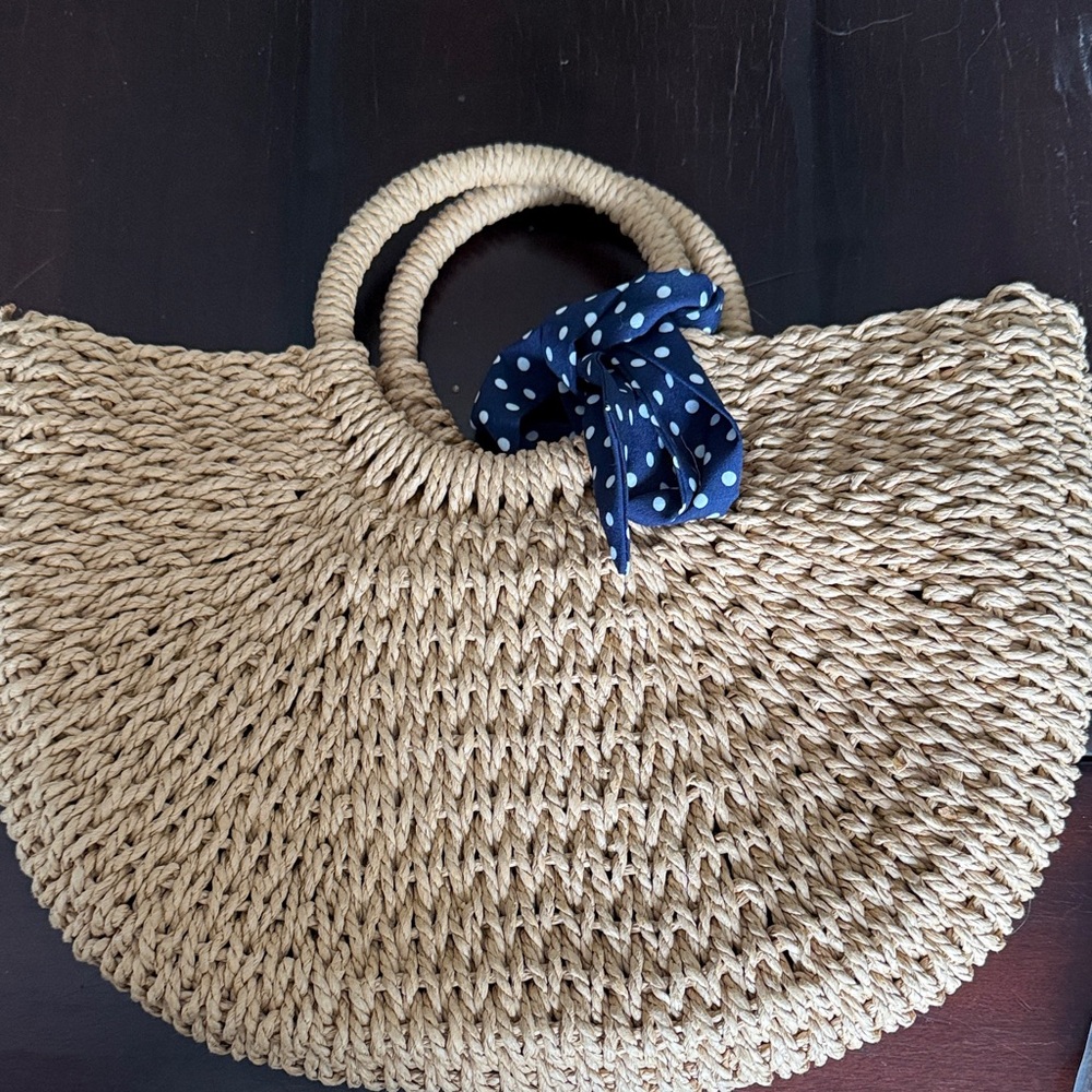 Stylish Tan Woven Handbag with Polka Dot Accent